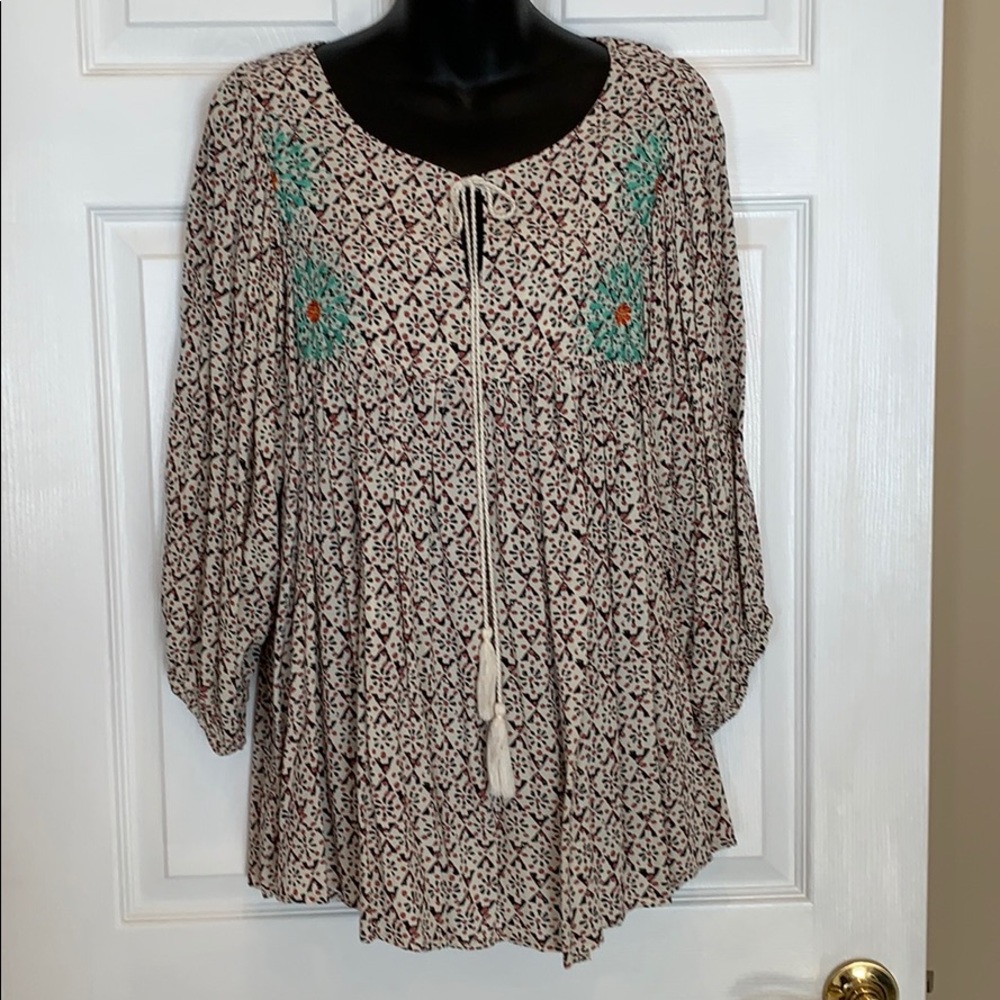 Multi patterned blouse in XL